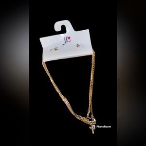 Diamond earrings, and necklace, with diamonds crosses.